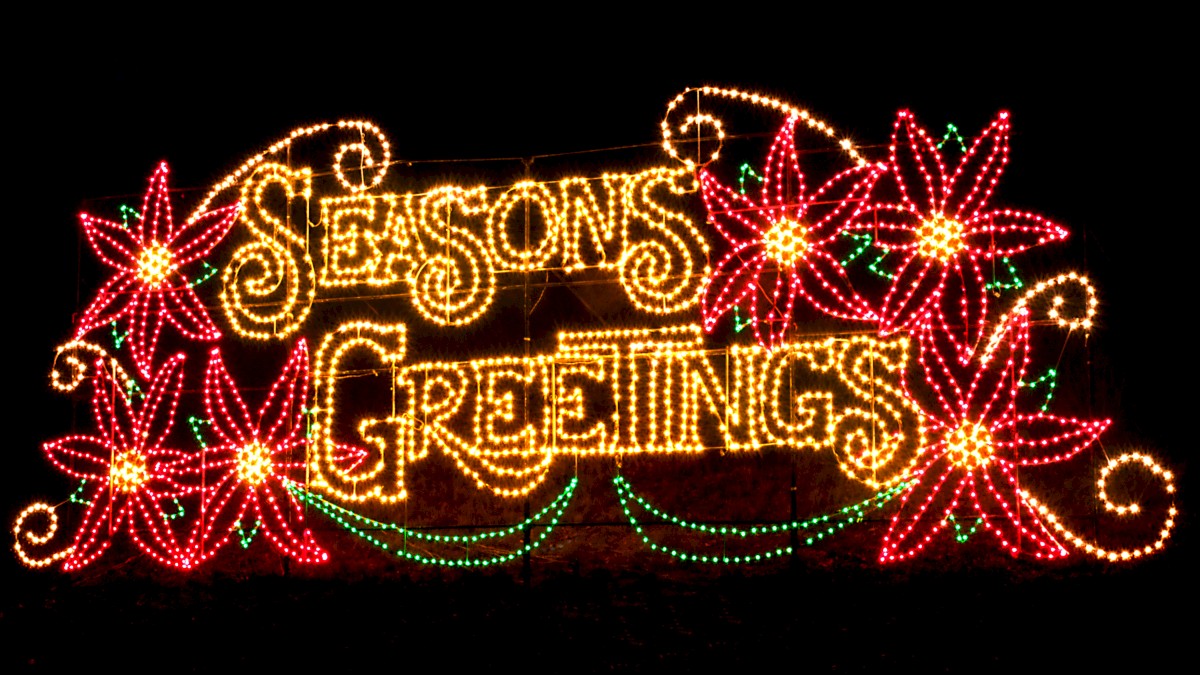 The image shows festive lights spelling 