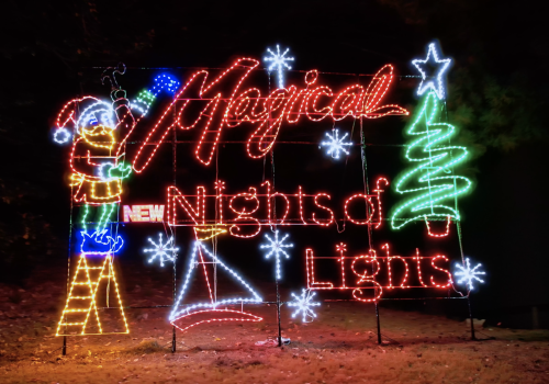 Colorful Christmas lights display reads 