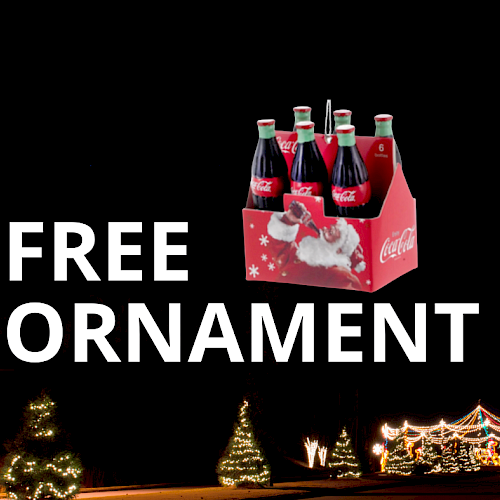 Free ornament: a 6-pack of Coca-Cola bottles in a red carrier, advertised against a dark festive scene.
