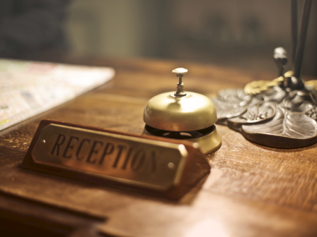 A brass reception bell, a 
