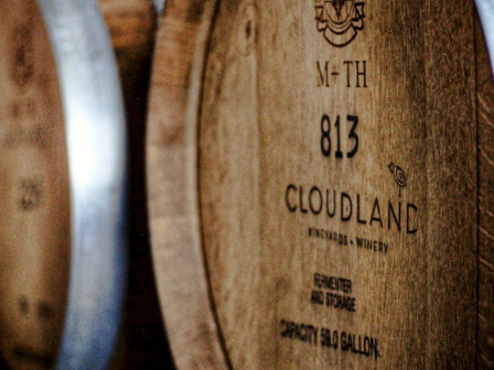 Wooden barrels labeled 